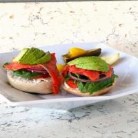 Deluxe Lox Bagel · Bagel with Cream cheese,Lox,Tomato,Onion,Spinach and Avocado. Plus side of spicy Carrot and ...