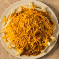 Chili Fries · Made from scratch all meat chili no beans topped with freshly shredded cheddar cheese