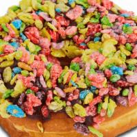 Fruity Pebble Raised · Chocolate iced raised dipped in Fruity Pebble cereal.