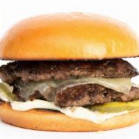 The Truffle Burger · Smashed double patties, dashi onions, truffle provolone cheese, pickle chips, truffle mayo o...