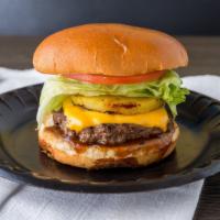 Hawaiian Burger · A 1/3 lb Burger with teriyaki sauce, pineapple slice, and American cheese on a brioche bun w...