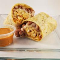 Breakfast Burrito · 3 scramble eggs, cheese, de la olla beans and/or potato, ham and/or chorizo
