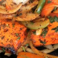 Paneer Tikka Kebab (6 Pieces) · Gluten-free. Paneer and vegetables marinated in lemon, yogurt, garlic and spices, grilled in...