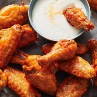12 Chicken Wings · Crispy chicken hot wings.