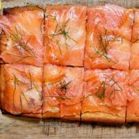 Salmon Socca Flatbread · Gluten Free. smoked salmon - creme fraiche - dill