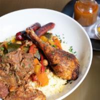 Moroccan Couscous Royal · chicken - merguez sausage - lamb - seven vegetables