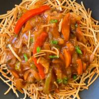 Veg Sweet And Sour American Chopsuey · Exotic vegetables in Sweet and Sour  Sauce served with crispy noodles.