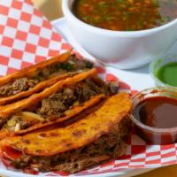 Tacos Dorados De Birria · These tacos are a corn tortilla with birria, cheese, onions, and cilantro, fried on the gril...
