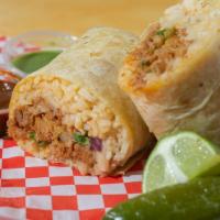 Burrito · Burritos contain rice, beans, onion, cilantro, guacamole and your choice of meat.