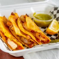Gobernador Tacos · Three tacos with shrimp, cheese, and pico de gallo.