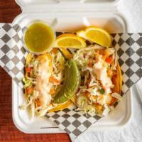 Baja Tacos · Your choice of baja fish or shrimp, cabbage, pico de gallo, dressing, and salsa on the side.