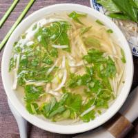 Hu Tieu Ga · Clear noodle soup with chicken.