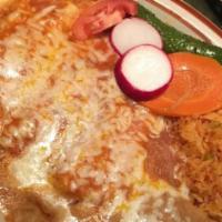 Three Cheese Enchiladas · Served with rice and beans.