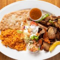 Carnitas Pork · With tortillas. Served with rice and beans.