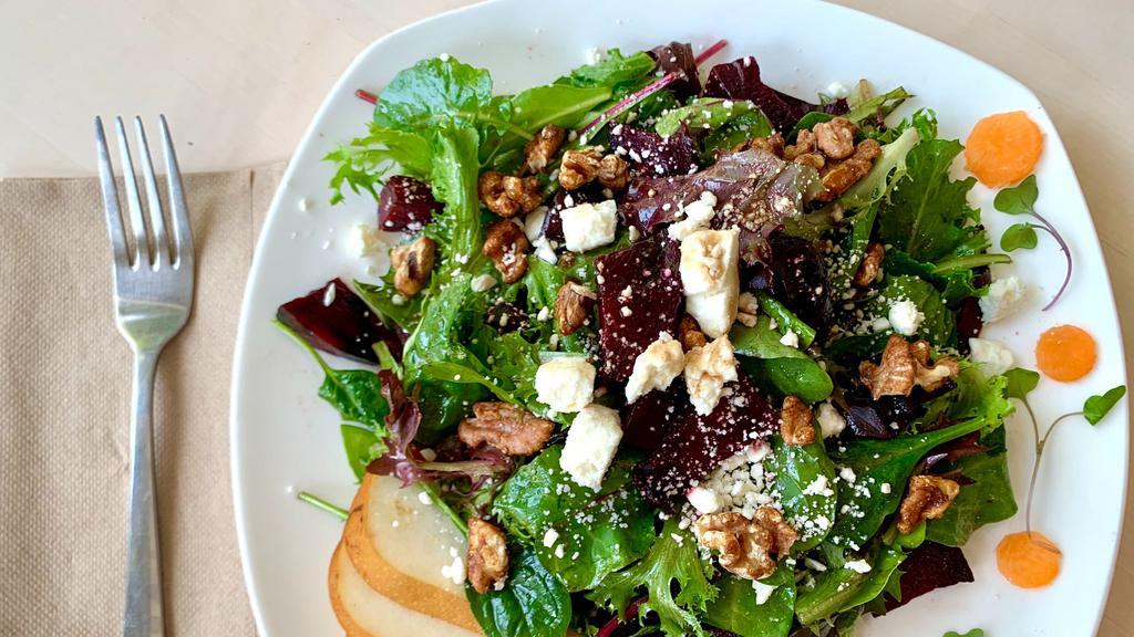 Beet Salad · Roasted beets, organic mixed green, organic baby spinach, candied walnuts, fetta cheese, pears, honey balsamic dressing