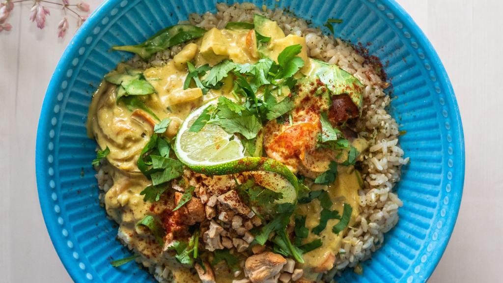 Tofu Curry Over Rice · Popular. Vegan. Coconut milk, tofu, chickpeas, veggies, spinach, brown rice.