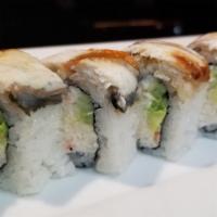 Dragon Roll · Imitation Crabmeat, avocado, cucumber. Topped with Eel. Eel sauce