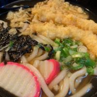 Tempura Udon · Japanese udon(noodle soup) with fried shrimp, fish cake, dried tofu, green onion, crunch, an...