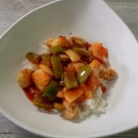 Sweet And Sour Chicken Rice Bowl · Yummy sweet and sour breaded chicken served with Asian-style sautéed vegetables, bell pepper...
