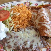 Two Chicken Enchiladas · With bell pepper, onion and tomato plus rice, beans, and salad.