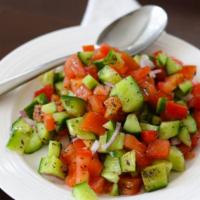 Salad Shirazi · Diced Persian cucumber, diced tomato, onion, mint, salt, pepper, olive oil and lemon juice.