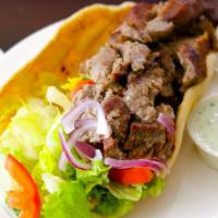 Gyros · Gyros meat, lettuce, tomato and onion, wrapped in pita bread.