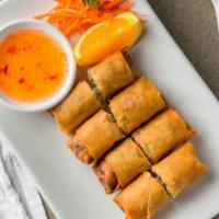 Fried Chicken Egg Rolls  · Golden fried Thai egg rolls with chicken, crystal noodles, carrots, celery, mushrooms, and c...