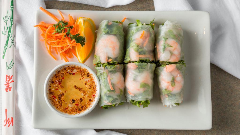 Fresh Shrimp Salad Rolls  · Gluten-free. Shrimp, tofu, rice noodles, lettuce, cucumbers, and carrots wrapped with rice paper, served with spicy garlic lime sauce and roasted peanuts.