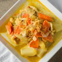 Mild Yellow Curry (Gang Karee Gai) · Choice of meat in a Mild yellow curry with potatoes, carrots, onions, and coconut milk.