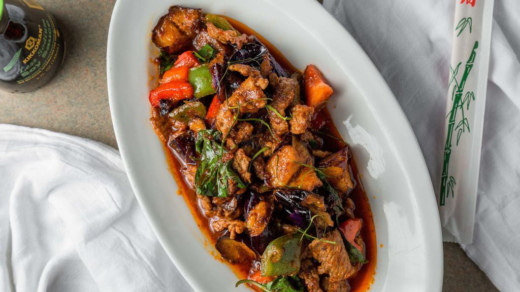  Spicy Eggplant · Gluten-free. Choice of meat, stir fried with Japanese purple eggplants, bell peppers, and Thai basil in a spicy red curry sauce. Add prawn or calamari, fish or seafood additional for an additional charge.