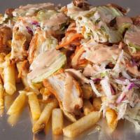 Joey-Eat-Fries · Chopped Chicken, CRIMSON Sauce, slaw, pickles, melted American cheese , over a bed of CRIMSO...