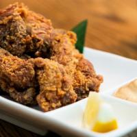 Japanese Fried Chicken Wing · Marinated fried chicken wing.