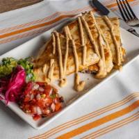 Carnitas Quesadilla · Michoacan style braised port, flour tortilla, mexican cheeses with guacamole, chipotle crema...