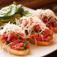 Bruschetta Francoli · Diced roma tomatoes, parmigiano reggiano cheese, garlic, basil, extra virgin olive oil on to...