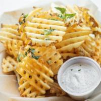 Waffle Fries · Deep fried to perfection, served with our garlic aloll and fresh basil...........