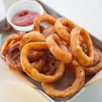 Beer Battered Onion Rings · Deep fried to perfection and served with our sploy harrisa ketchup.