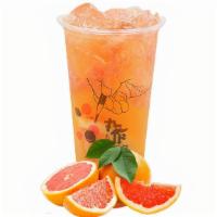 Grapefruit Green Tea · Freshly squeezed grapefruit juice, jasmine green tea, and grapefruit pulp.