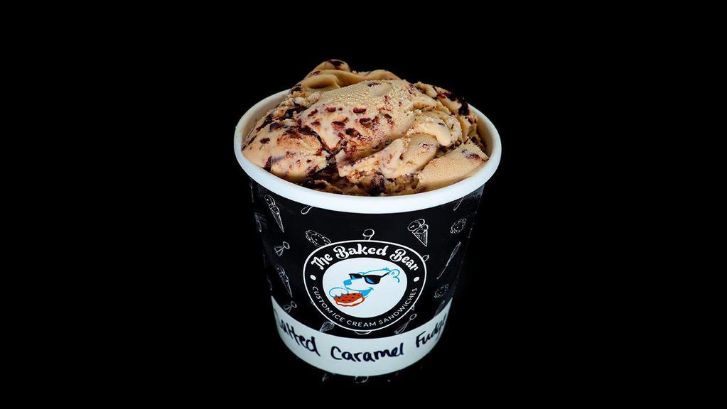 Caramel Pretzel Fudge Pint · Creamy Caramel Ice Cream w/ Pretzel Pieces and a Fudge Ripple.