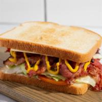Pastrami & Swiss Cheese · Choice of bread toasted with mayo and mustard spread, grilled pastrami, Swiss  cheese, tomat...