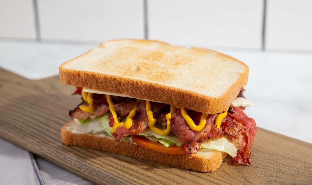 Pastrami & Swiss Cheese · Choice of bread toasted with mayo and mustard spread, grilled pastrami, Swiss  cheese, tomato and lettuce.