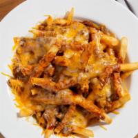 Chili Cheese Fries · Fries smothered in meaty chili, and topped with cheddar cheese.