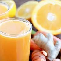 Tumeric Orange Juice  · 8OZ TUMERIC , ORANGE , BLACKPEPPER