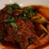Beef Short Rib Birria · Seasonal Vegetables, caramelized onion rings, roasted tomato chile broth, cilantro, corn tor...