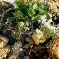 Charred Brussel Sprouts · Cotija, lime juice, red wine vinegar, smoked jalapeño rémoulade.