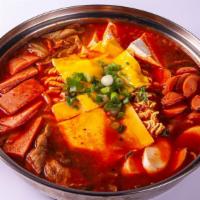 Budae Jjigae(For 2) · Spicy stew with Beef, Pork, Kimchi, Tofu, Spam, Noodles, Cheese and  Veggies