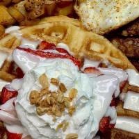 Berry American Me · Fresas con crema waffle, 2 eggs any style, 2 turkey sausage or turkey bacon, tater tots or h...