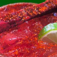Spiced Up Agua Fresca Large (24Oz) · Agua fresca of your choice with Tajin, lime, chamoy and a Tamarindo stick, topped with a sli...