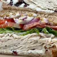 Day After · Smoked thin-sliced Turkey, Cream Cheese, Sweetened and dried Cranberries, Green Leaf Lettuce...
