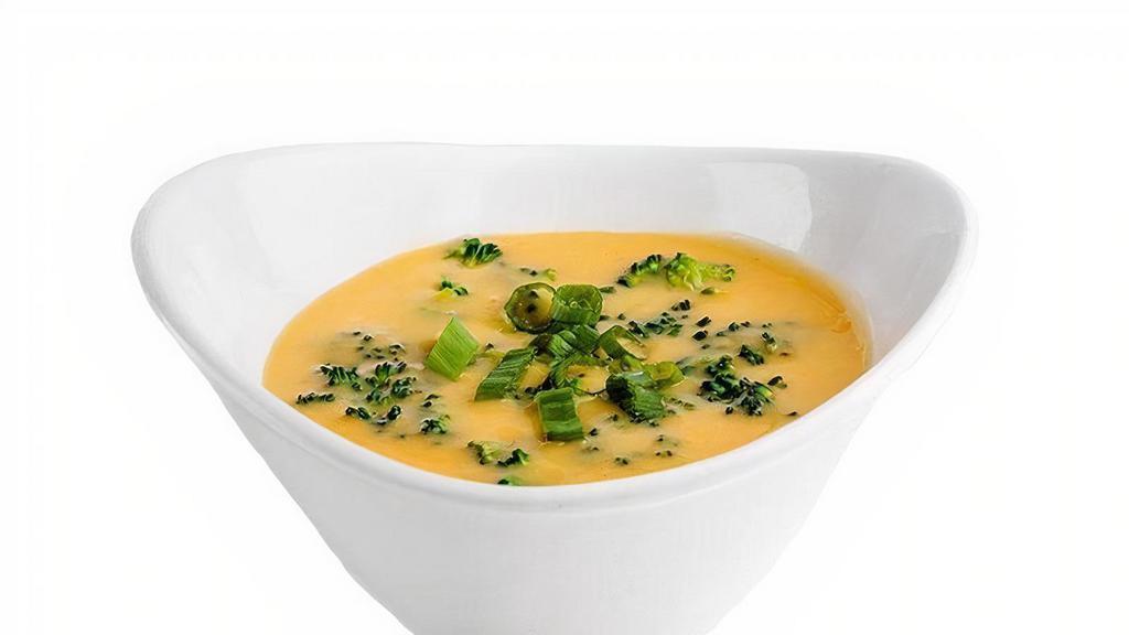 Broccoli Cheddar Soup (Bowl) · creamy plant-based cheddar soup, broccoli, green onion