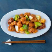 Sweet And Sour Chicken · Crispy chicken breast, green bell peppers, onions and pineapple in a sweet and sour sauce.